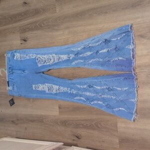 Distressed Blue Flare Jeans